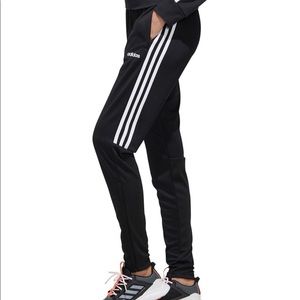 >Black adidas pants with half stripes